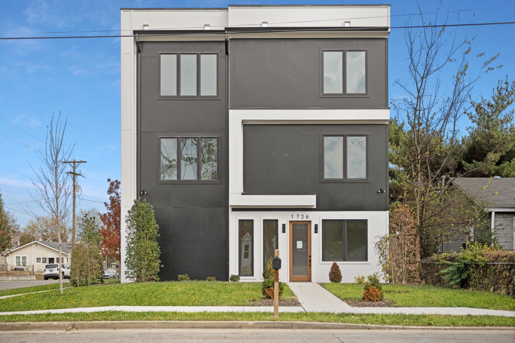 Experience Refined Living at 1726 Nassau St: This Modern 4-Bedroom Home Features a Rooftop Deck, a Spa-Inspired Primary Suite, and Spacious Entertainment Areas, Perfectly Combining Luxury with Functionality